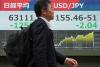Asian stocks are mixed as yen jumps against the dollar, while oil prices