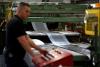 UK July manufacturing PMI revised down to 4-month low