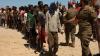 72 dead after migrant rush into Spanish enclave - after 60,000 storm into Ceuta
