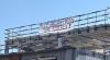 "Brown men to the back": Banner along Belgian highway seemingly refers to Dutch singer