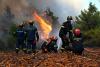 Greek wildfires halted after fatal helicopter crash