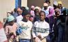 Alexandra’s children get reflective beanies to keep them safe in the dark