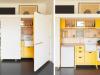 Tiny Melbourne apartment reveals secret fold-out kitchen