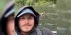 Video: Fisherman and grizzly bear share Alaskan river while hunting for salmon