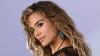 Karol G breaks down in tears after emotional message to fans during concert