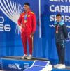 Noel claims third gold medal in record-breaking fashion