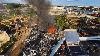 Crews respond to fire at EMR Southern Recycling on Bayou Chico in Pensacola