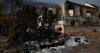 Fires ease in Greece as people return to gutted homes