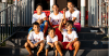 Children follow parents' football footprint