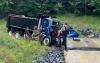 Maine dump truck crashes into concrete culvert while passing a tractor-trailer