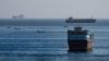 Iran, Oman negotiate temporary shipping route through Strait of Hormuz