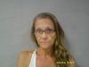 West Virginia Woman Accused of Attacking Man with Firewood While He Slept