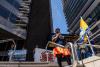 ‘Working past exhaustion in extreme heat’: migrant farm workers rally in Toronto