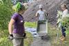 Volunteers build new walking path at Delki Dozzi Community Food Forest