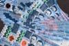 Peso slides back to P61 level on uncertainty over US-Iran talks