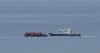 French, UK teams rescue 157 migrants after boat fire