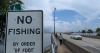'No Fishing' signs to be removed, replaced with 'No Littering' signs after public backlash
