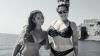 Kelly Brook flaunts her curvy figure in a leopard print bikini as she sets sail with husband Jeremy Parisi in Italy