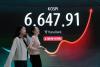 Oil prices ease and Asian shares gain on hopes for Mideast deal
