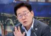 President calls on agencies to review mail or e-voting for overseas Koreans