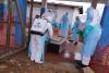 WHO chief visits Congo to support Ebola efforts as some workers strike over pay