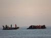 Over 150 migrants rescued from burning boat in English Channel, no fatalities reported