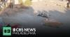 Migrants sleep on closed-off beach in Ceuta as Spain responds to border surge