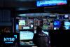 US stock futures edge higher and oil resumes ascent