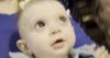 Moment baby born blind sees city lights for first time after eye surgery