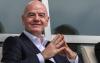 Embattled FIFA chief Infantino in emergency talks, suffers Figo blow