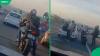Joburg biker backs down after driver pulls axe in road rage standoff video