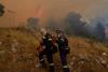 Firefighters hurry to control fires outside of Athens before strong winds, high temperatures return
