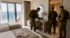 Israeli soldiers carry off doors, soap, and slippers from a hotel in Lebanon. The army launches an investigation.