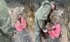 Russian soldier is made to wear a dress and told he'll be made to wear it in 'meat-grinder' as punishment for deserting post