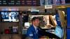 Wall Street mixed amid Iran optimism, earnings concerns