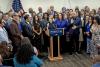 Healey signs immigrant protection bill