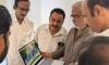 Minister K Partha Sarathy unveils Press Club Amaravati logo