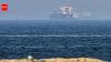Deal on Hormuz shipping route reached with Oman, says Iran