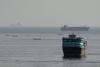 Iran, Oman Near Deal on New Hormuz Shipping Route, but Tehran Says Strait Will Not Reopen Yet