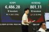 Seoul shares extend losses late Thursday morning on tech slump