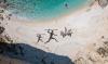 Prehistoric Hunters Confront Oil Platform Silhouette in Land Art and Offshore Drilling Protest on Greek Island