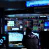 Stocks hover near record highs and oil prices stabilise with talk of a deal to open Strait of Hormuz