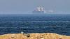 Iran says route agreed with Oman to resume Hormuz shipping, warns security risks remain