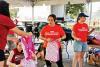 Be Strong International serves community members at food drive, backpack distribution