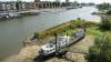 Dutch houseboat owners left high and dry by falling river levels