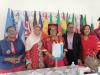 Esther Omam earns PhD, honourary Doctora...