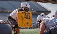 Wyoming's Smiley Samoan Slides Into Potential Starting Role