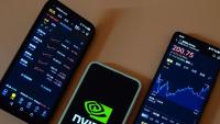 NVDA, PLTR, CAT Defy Michael Burry’s AI Bet — ‘Big Short’ Investor Warns Of Future ‘Ghost Towns’