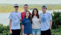 College basketball coach seriously injured after horrific truck crash into bridge before being rushed to hospital