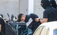 Afghan migrant charged over Athens suitcase murder